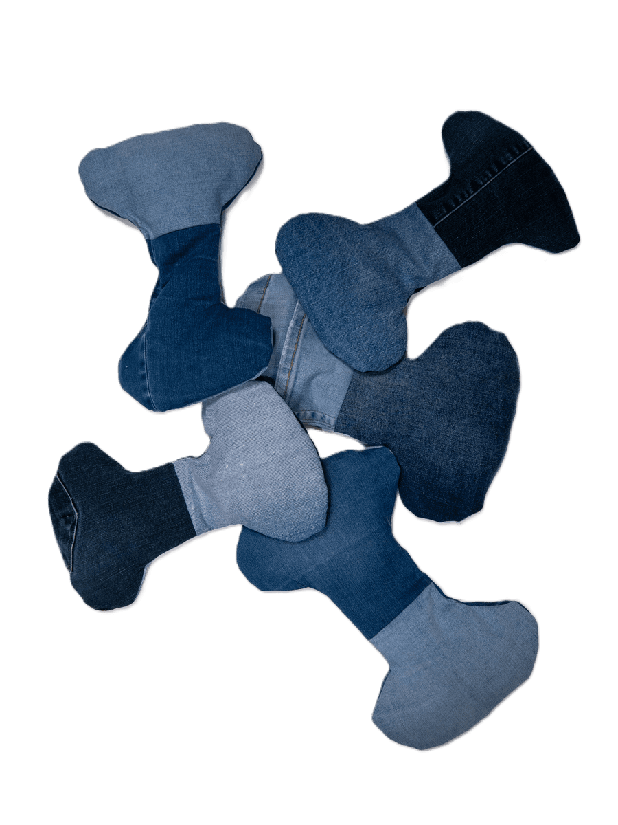 Pile of small denim bone toys